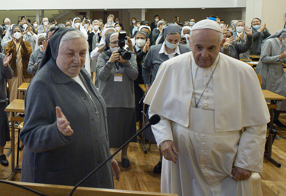 Sr. Yvonne Reungoat, then superior of the Salesian Sisters, is pictured with Pope Francis during a meeting with members of the order in Rome in this Oct. 22, 2021, file photo. (CNS/Vatican Media)