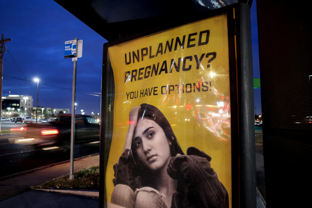 A billboard at a bus stop in Oklahoma City advertises adoption services for pregnant women Dec. 7, 2021. (CNS/Reuters/Evelyn Hockstein)