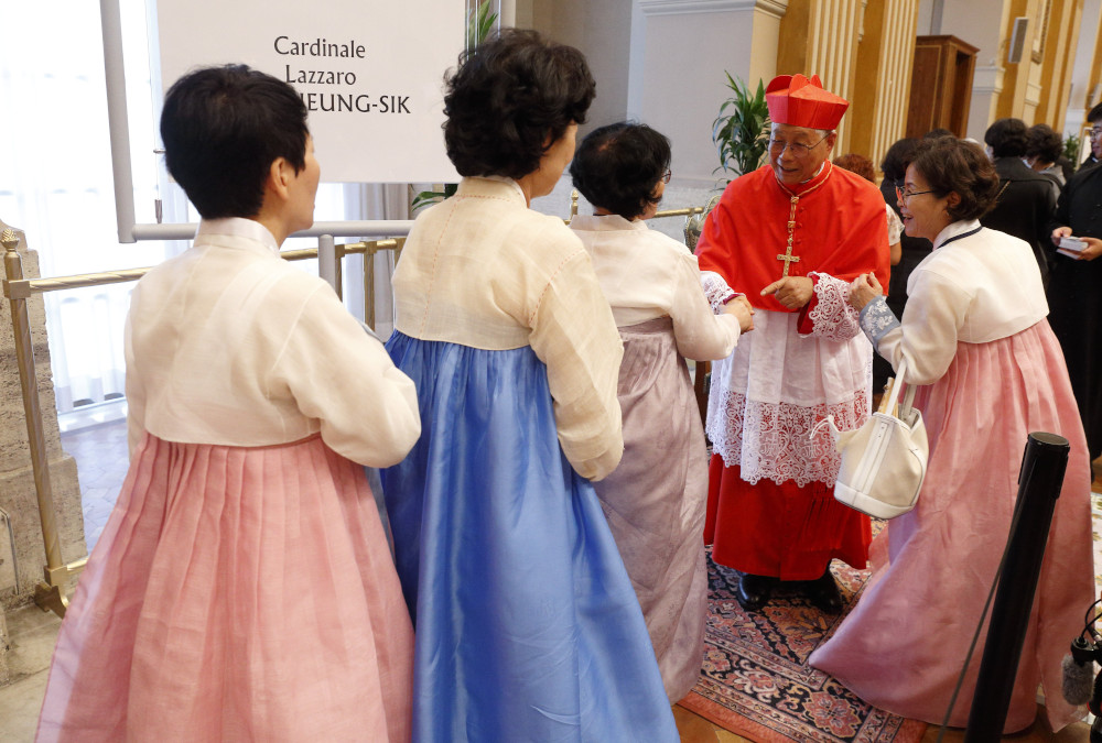 New South Korean Cardinal Lazarus You Heung-sik, prefect of the Dicastery for Clergy, greets guests at a reception after a consistory for the creation of 20 new cardinals at the Vatican Aug. 27 , 2022. (CNS photo/Paul Haring)