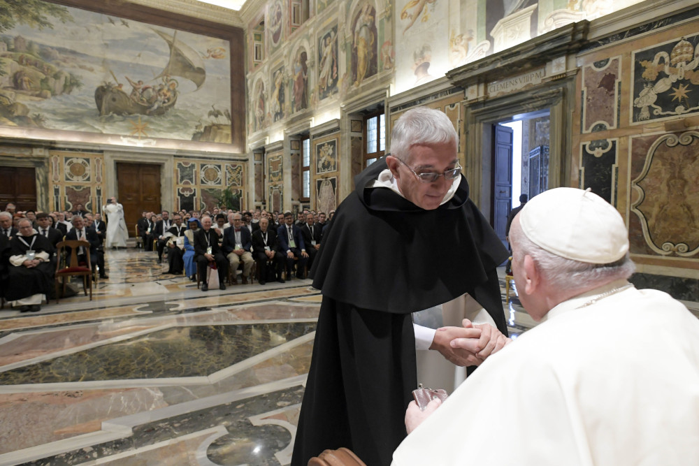 Pope Francis greets Dominican Father Serge-Thomas Bonino, president of the Pontifical Academy of St. Thomas Aquinas, during an audience with participants attending the International Thomistic Congress, at the Vatican Sept. 22, 2022