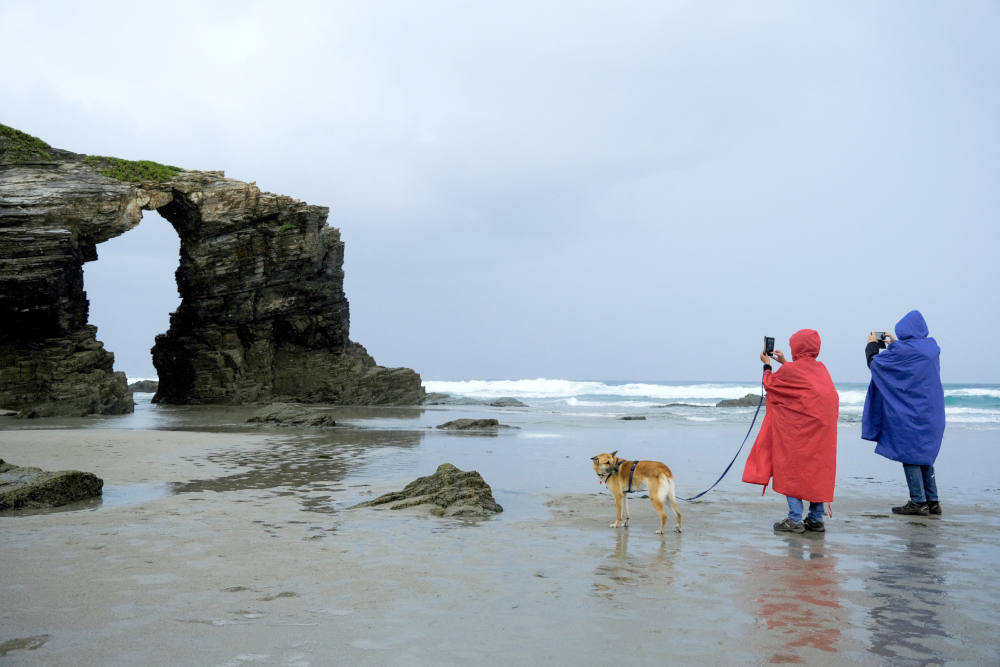 Tourists visit Cathedral Beach at low tide in Ribadeo, Spain, Sept. 25, 2022. (CNS photo/Nacho Doce, Reuters)