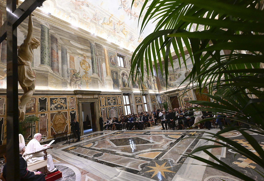 Pope Francis leads an audience with participants attending a conference promoting educational initiatives for migrants and refugees, Sept. 29 at the Vatican. (CNS/Vatican Media)