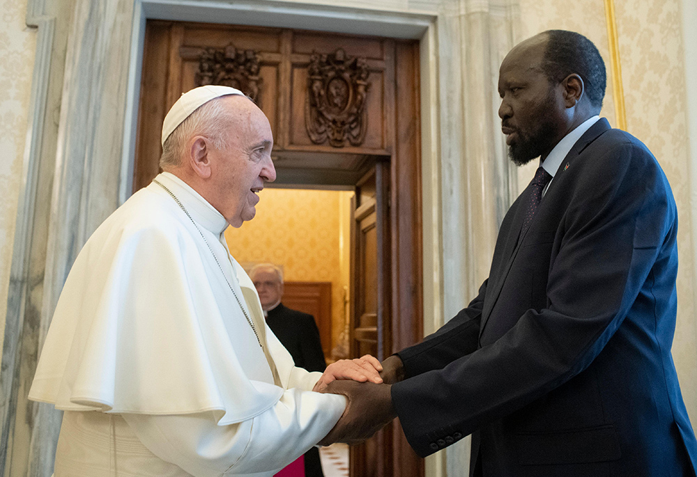 Pope Francis shakes hands with South Sudanese President Salva Kiir during a private audience March 16, 2019, at the Vatican. The pope will visit South Sudan Feb. 3-5, on a trip that will also take him to Congo. (OSV News/Vatican Media)