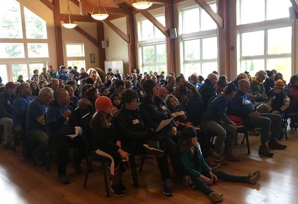 Parishioners of Holy Family-St. Lawrence Parish in Essex Junction, Vermont, gather in the parish hall for Serve Your Neighbor Day in October 2018. (Stephanie Clary)