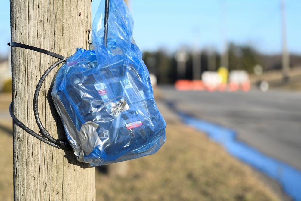 An air monitoring device is fixed to a pole in East Palestine, Ohio, Feb. 15, 2023, in the aftermath of a Feb. 3 train derailment that dumped toxic chemicals into the environment. An Ohio Catholic priest told OSV News that "it will be a long time" before he and his parishioners feel secure in their surroundings. (OSV News photo/Reuters/Alan Freed)