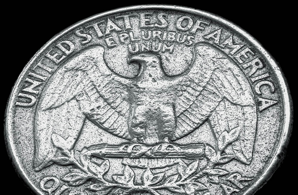 "E pluribus unum" on a U.S. quarter (Unsplash/Chris Briggs)