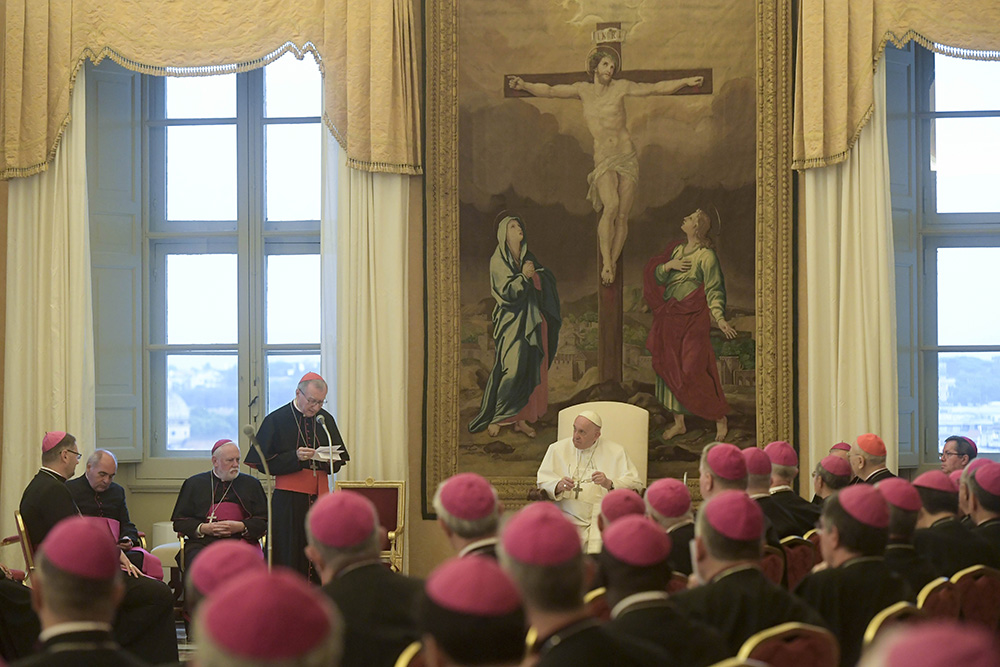 Pope Francis listens as Cardinal Pietro Parolin, Vatican secretary of state, speaks during a meeting with papal nuncios from around the world at the Vatican Sept. 8, 2022. The pope said that Europe and the entire world are being shaken by "a particularly serious war, due to the violation of international law, the risks of nuclear escalation and the drastic economic and social consequences." (CNS/Vatican Media)