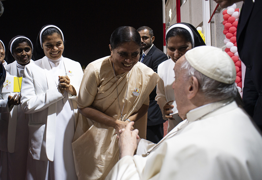 Sr. Maria Nirmalini, the superior general of the Apostolic Carmel congregation and sisters of the Apostolic Carmel congregation, meet with Pope Francis in Bahrain in November 2022. (Vatican Media/Francesco Sforza)