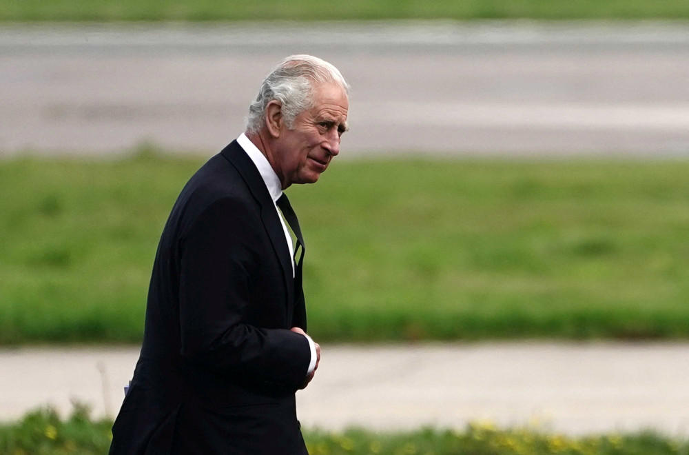 Britain's King Charles III walks at Aberdeen Airport in Scotland as he travels to London Sept. 9, 2022, following the Sept. 8 death of Queen Elizabeth II. (CNS photo/Aaron Chown, pool via Reuters)