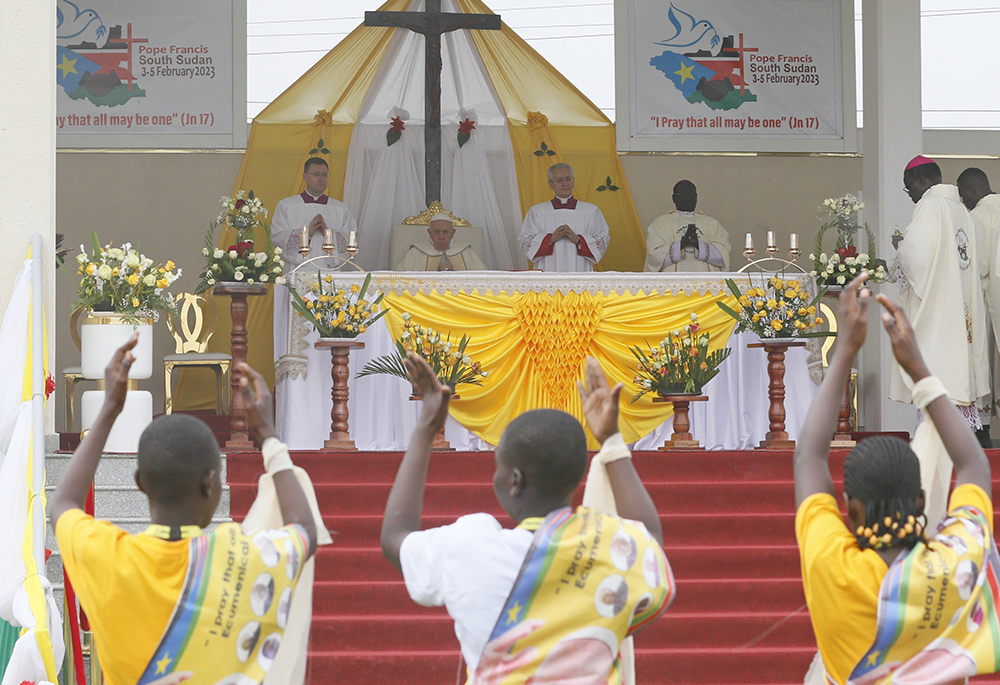 Dancers perform as Pope Francis begins the celebration of Mass at the John Garang Mausoleum Feb. 5 in Juba, South Sudan. (CNS/Paul Haring)