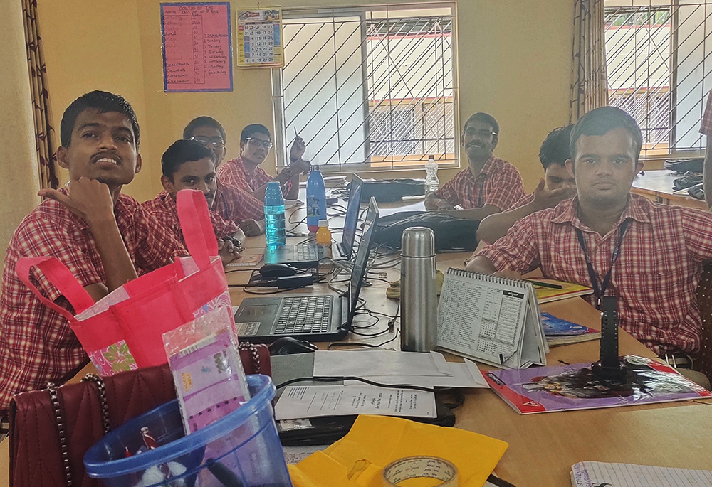 Former students serve the data entry unit of the Manasa Rehabilitation and Training Centre. (Thomas Scaria)