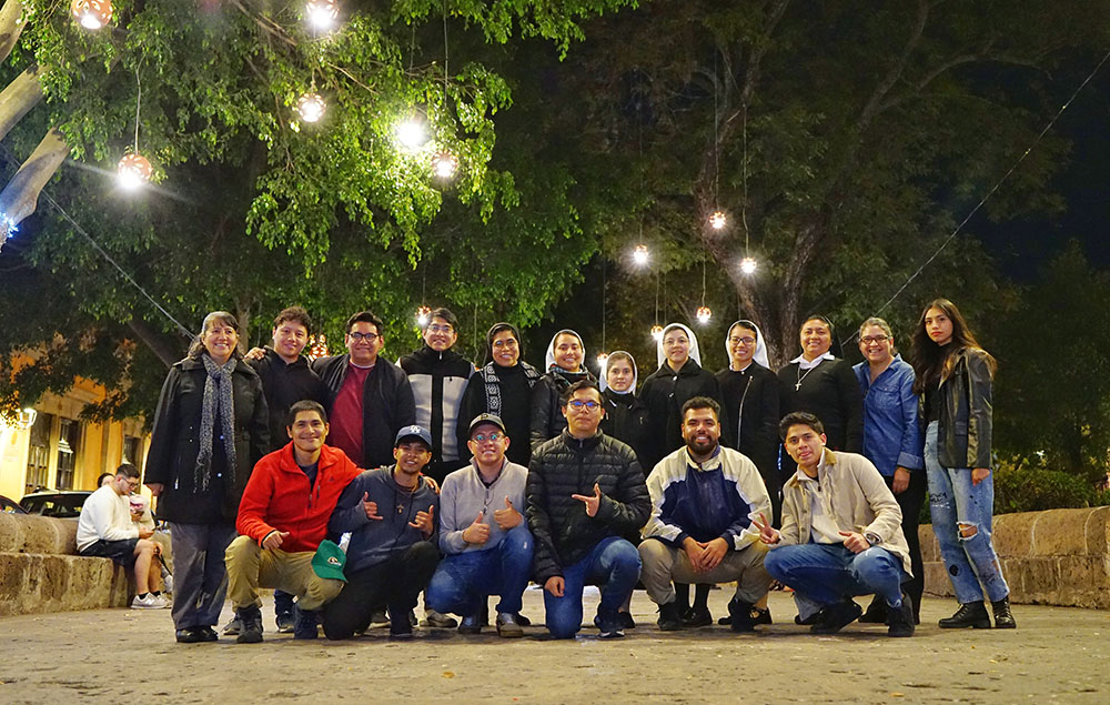 A group of young adults and members of the Verbum Dei Missionary Fraternity on a pilgrimage to the Sanctuary of Our Lady of Guadalupe in Morelia, Mexico (Courtesy of Asaid Castro)