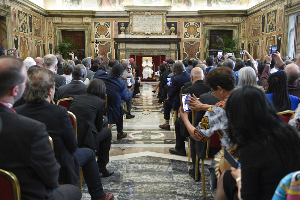 Pope Francis speaks to participants in the general assembly of Caritas Internationalis at the Vatican May 11, 2023. Caritas Internationalis is the umbrella organization for 162 official Catholic charities working in more than 200 countries. (CNS photo/Vatican Media)