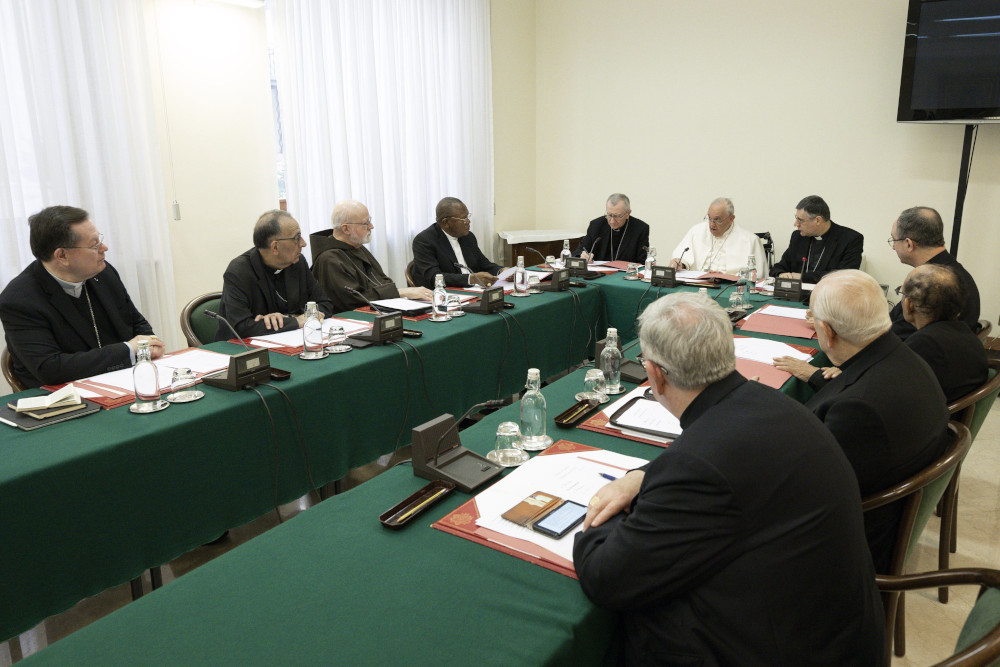 Pope Francis meets with the members of the Council of Cardinals at the Vatican April 24, 2023. Pictured, clockwise from the left, are: Cardinals Gérald C. Lacroix of Québec; Juan José Omella Omella of Barcelona; Seán P. O'Malley of Boston; Fridolin Ambongo Besungu of Kinshasa, Congo; and Pietro Parolin, Vatican secretary of state. Continuing, to the right of the pope are: Bishop Marco Mellino, council secretary; and Cardinals Sérgio da Rocha of São Salvador da Bahia, Brazil; Oswald Gracias of Mumbai, India;