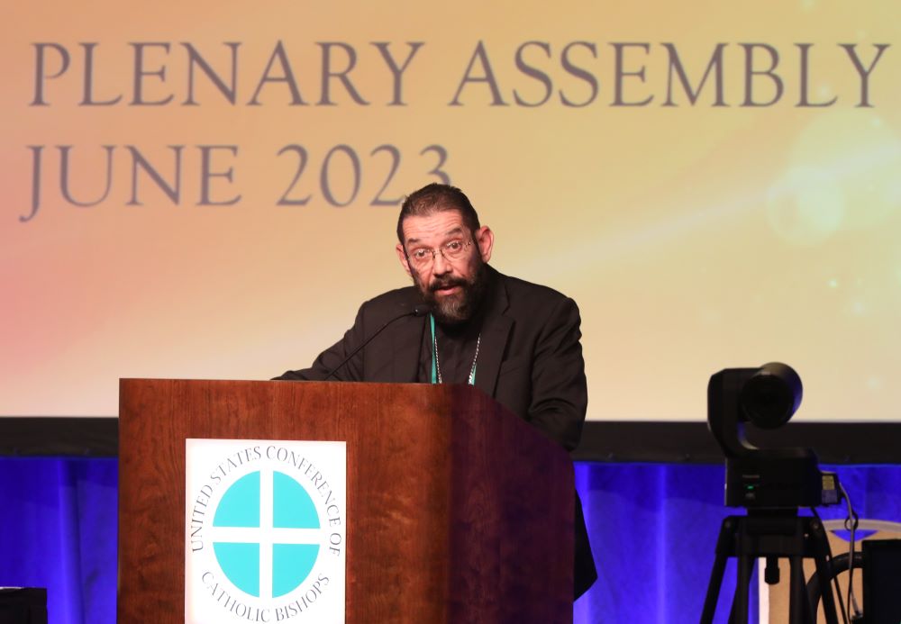 Bishop Daniel E. Flores of Brownsville, Texas, speaks June 15, 2023, during the U.S. Conference of Catholic Bishops' spring plenary assembly in Orlando, Fla. Bishop Flores is chairman of the USCCB's Committee on Doctrine. (OSV News photo/Bob Roller)