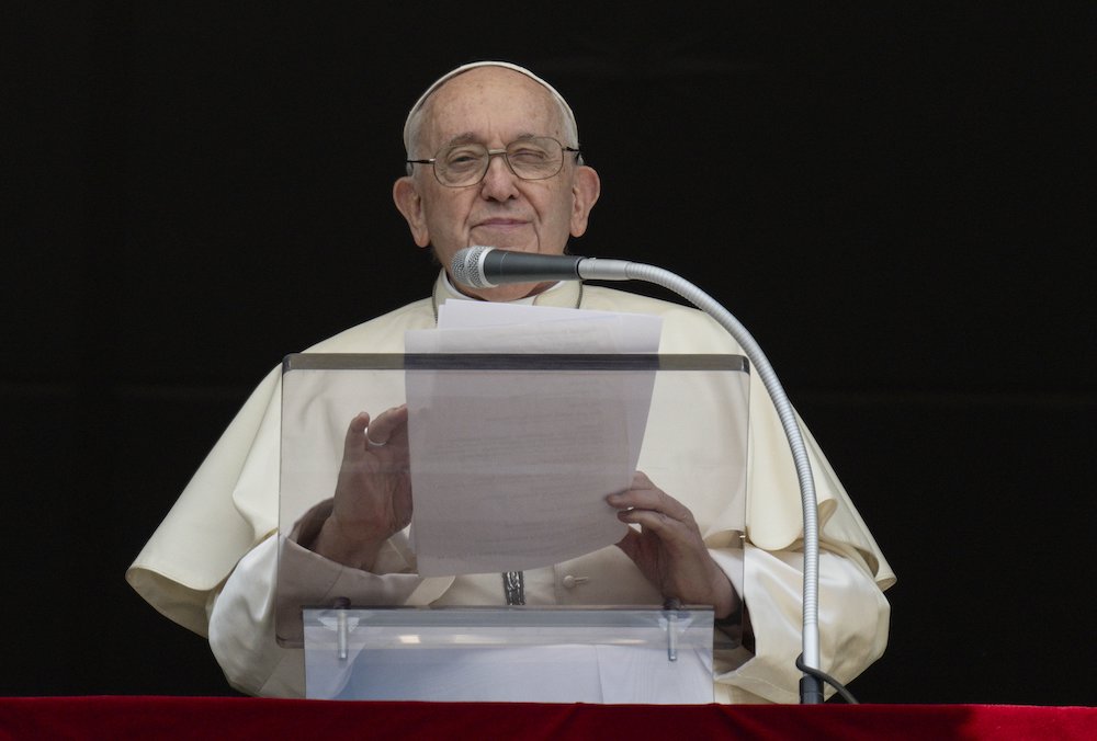 Pope Francis speaks to visitors gathered in St. Peter's Square at the Vatican before praying the Angelus July 2. (CNS/Vatican Media)