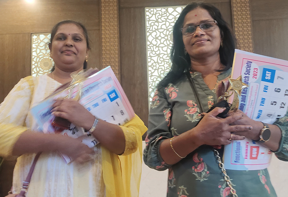 Pramila Kumari, left, and Bindu Puthenparambil, two women supported by the St. Joseph of Tarbes nuns through self-help groups and vocational training for self-reliance in the southern Indian city of Bengaluru. (Thomas Scaria)