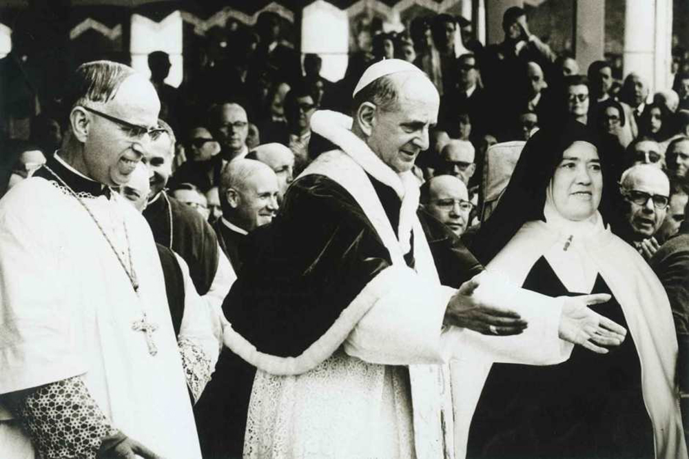 St. Paul VI is pictured next to Carmelite Sr. Lucia dos Santos, one of the three Fatima visionaries, during a visit to the Marian shrine in Fatima, Portugal, May 13, 1967. Sister Lucia died Feb. 13, 2005, at the age of 97. She was declared "venerable" on June 22 by Pope Francis. (OSV News/Courtesy of Diocese of Brescia)