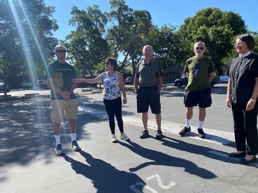 Tim Williams, Janet Lane, Gerry Braun, all current or former members of St. Martin’s Buildings and Grounds Committee, Neil Willits, co-senior warden, and the Rev. Debbie Hawkins, an associate priest, talk gather at the church to discuss its journey to carbon neutral.