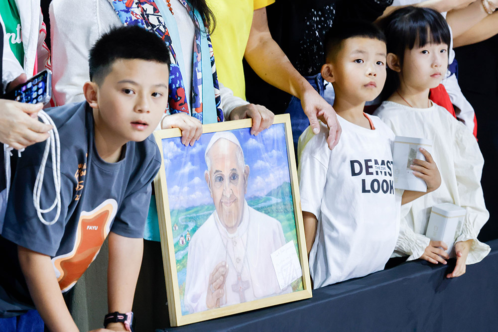 Children wait to see Pope Francis as he arrives at the Steppe Arena to celebrate Mass in Ulaanbaatar, Mongolia, Sept. 3. (CNS/Lola Gomez)