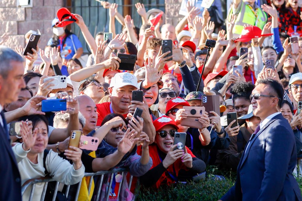 People cheer as Pope Francis leaves Sts. Peter and Paul Cathedral after meeting bishops, priests, deacons, religious, seminarians and pastoral workers in Ulaanbaatar, Mongolia, Sept. 2. (CNS/Lola Gomez)