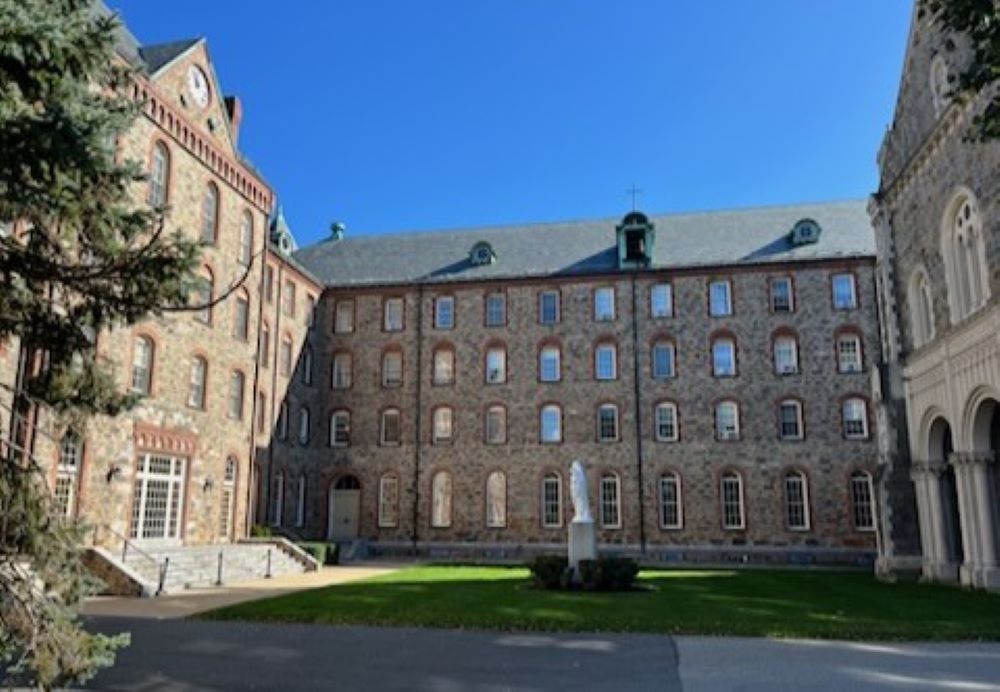 Exterior of three brick buildings in a U-shape