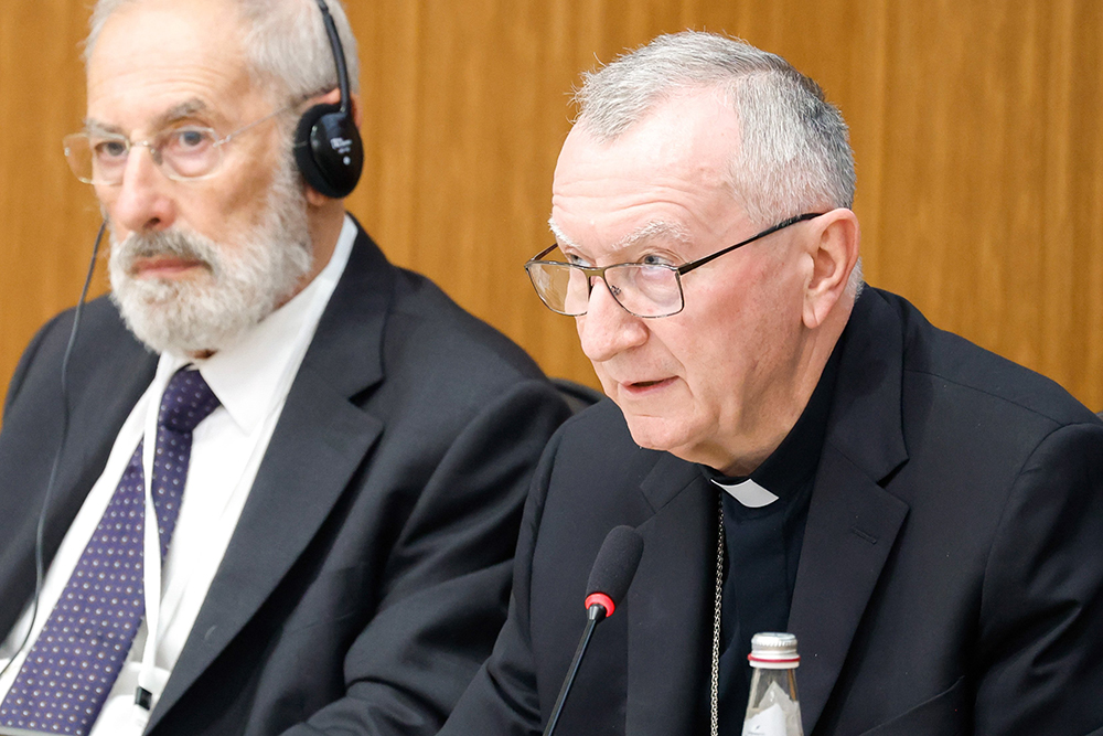 Cardinal Pietro Parolin, Vatican secretary of state, speaks at the conference "New Documents from the Pontificate of Pope Pius XII" as Rabbi Riccardo Di Segni listens at the Pontifical Gregorian University in Rome, Oct. 9. (CNS/Lola Gomez)