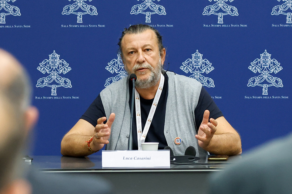 Luca Casarini, a special synod guest from the aid organization Mediterranea Saving Humans, speaks during a briefing about the assembly of the Synod of Bishops at the Vatican Oct. 11. (CNS/Lola Gomez)