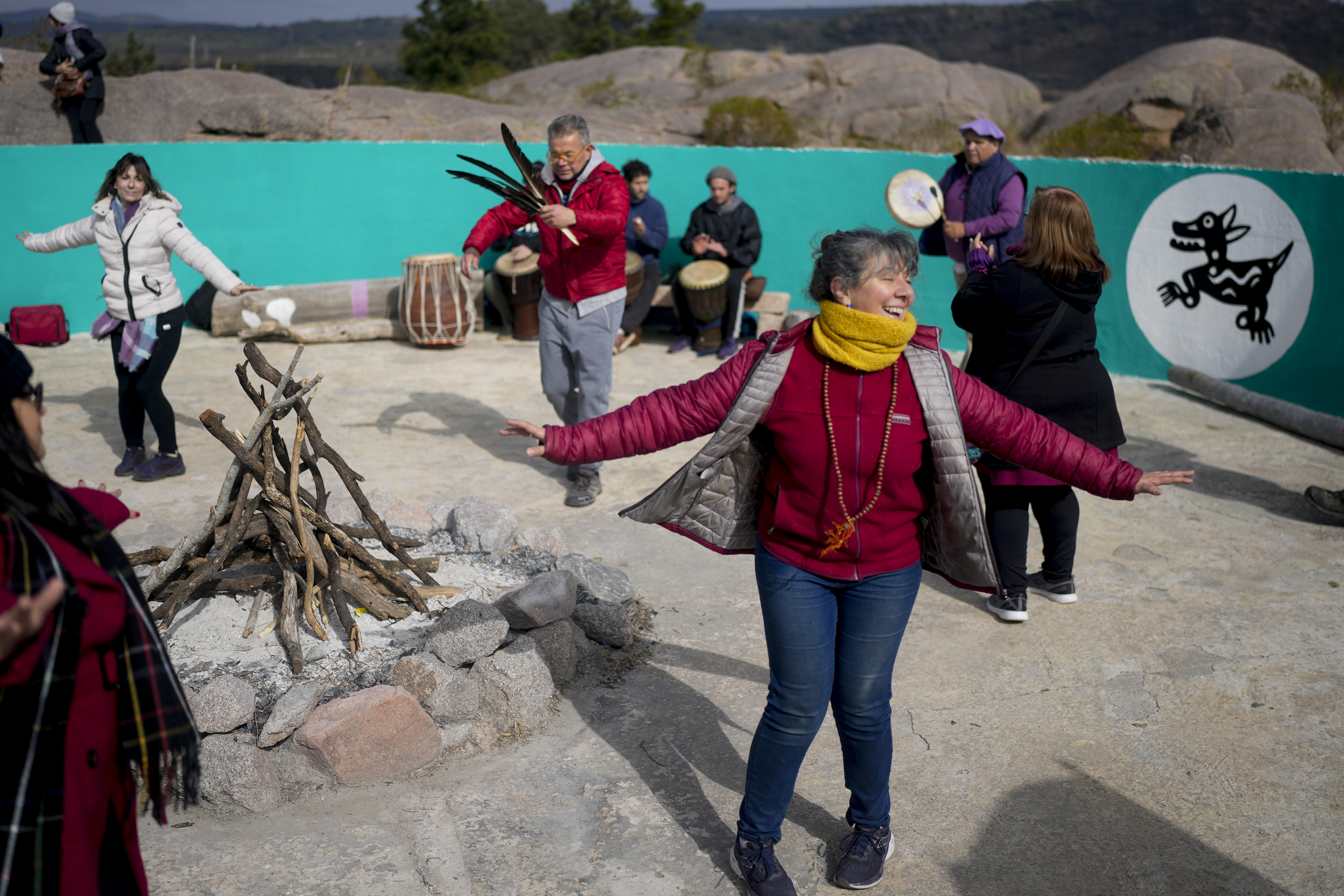 Monica Marracino dances in a spiritual ceremony near the Uritorco hill in Capilla del Monte, Cordoba, Argentina, July 18. (AP/Natacha Pisarenko)