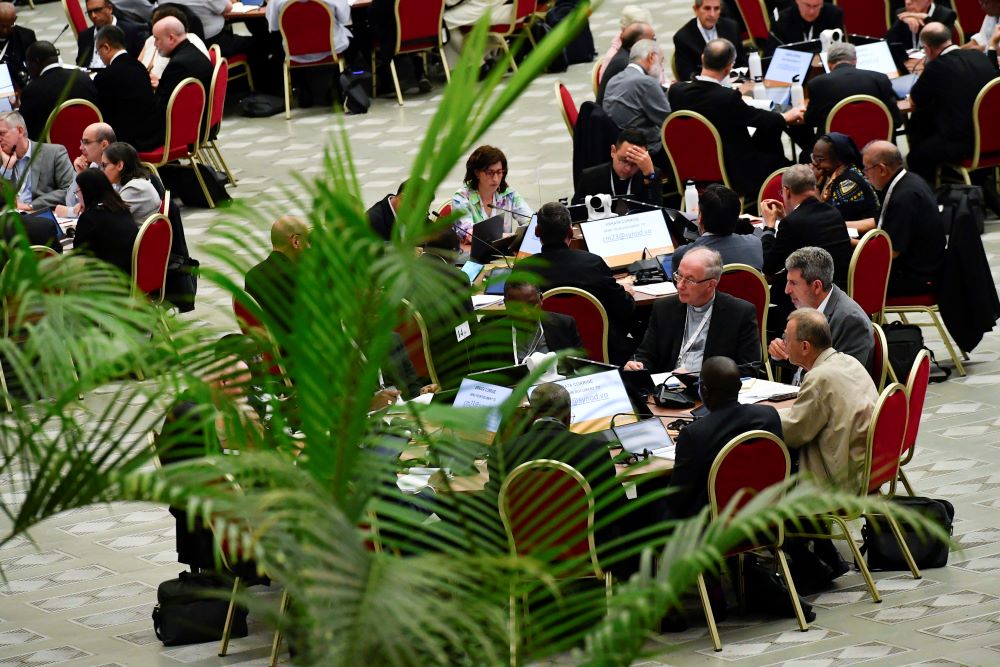 Members of the assembly of the Synod of Bishops, organized into 35 groups based on language, begin their small-group discussions 