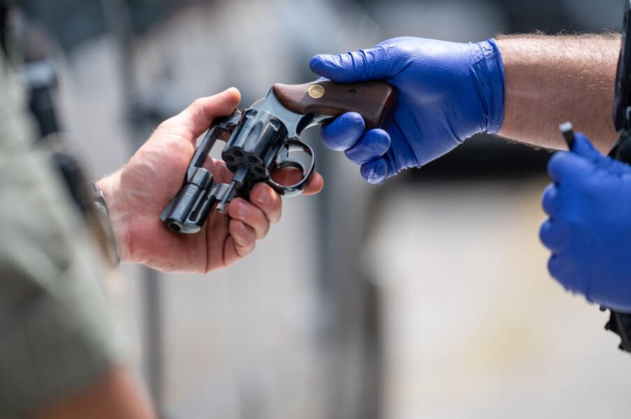 Baltimore City Police collected more than 300 guns during a gun buyback and resource event Aug. 5 at the Edmondson Village Shopping Center in West Baltimore. (OSV News/Catholic Review/Kevin J. Parks)