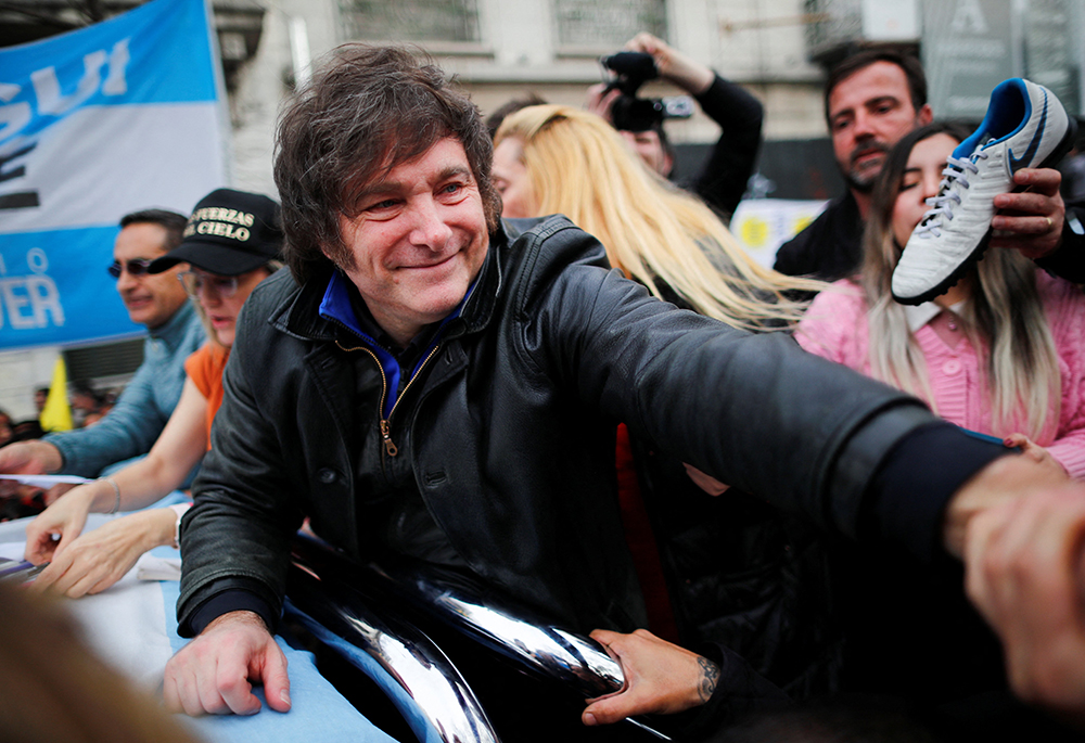 Argentine presidential candidate Javier Milei of La Libertad Avanza coalition greets supporters during a campaign rally Sept. 12 in Buenos Aires. (OSV News/Reuters/Agustin Marcarian)