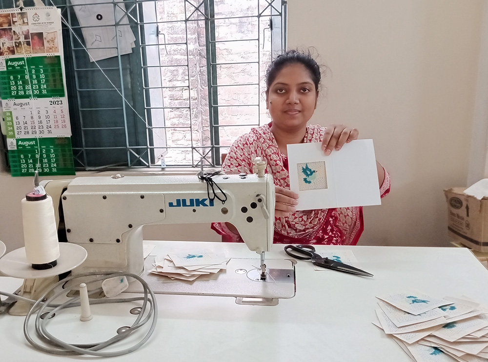 Bithi Rozario, an artisan of CJW, makes Christmas cards. (Sumon Corraya)