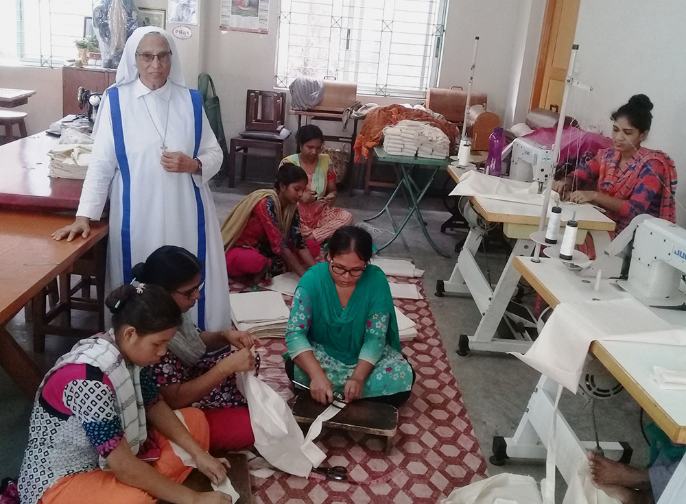 Sister Mary Lillian with artisans of CORR-The Jute Works in Dhaka, Bangladesh (Sumon Corraya)