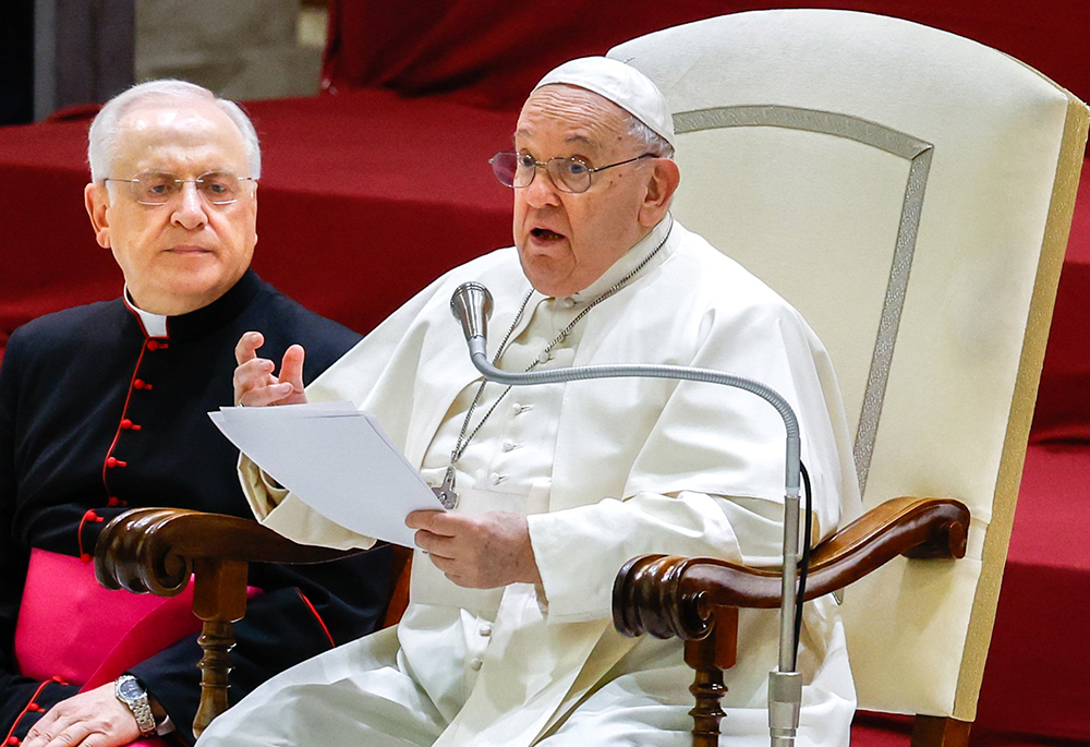 Pope Francis speaks to visitors during his general audience in the Paul VI Audience Hall at the Vatican Dec. 13. (CNS/Lola Gomez)