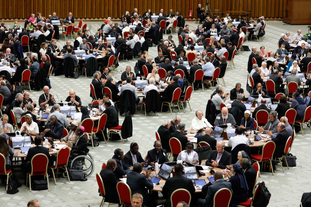 Members of the assembly of the Synod of Bishops start a working session in the Vatican's Paul VI Audience Hall Oct. 18. (CNS/Lola Gomez)