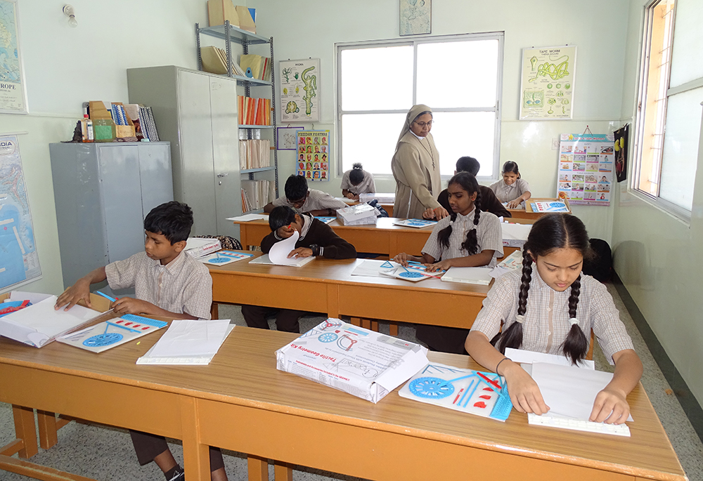 Franciscan Sisters Servants of the Cross Sr. Mary Teresita teaches blind students at Jyothi Seva School in Bengaluru, southern India. (Courtesy of Sr. Mary Clare)