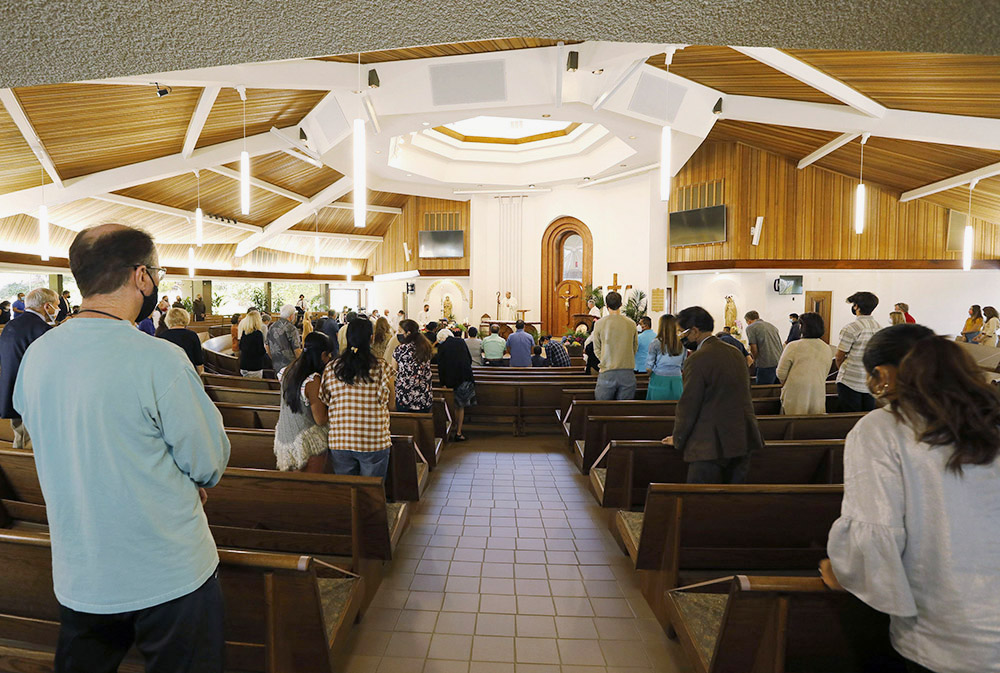 Bishop Robert McElroy of San Diego celebrates a bilingual Mass for Earth Week at St. James Church in Solana Beach, California, April 17, 2021. (CNS/The Southern Cross/John Gastaldo)