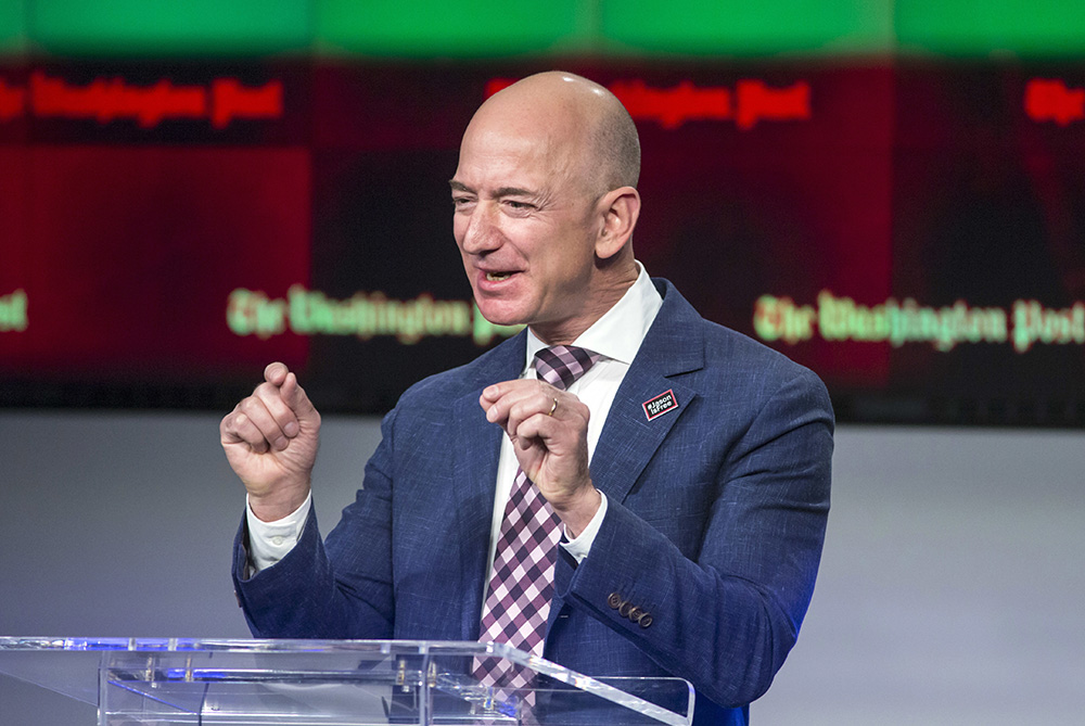 Billionaire Amazon founder and Washington Post owner Jeff Bezos talks about the history and character of the Post during a dedication ceremony for its new headquarters in Washington, D.C., Jan. 28, 2016. (AP/J. Scott Applewhite, File)