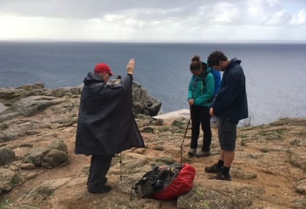 Fr. Peter Daly blesses a young couple on the Camino in Spain in 2016. 