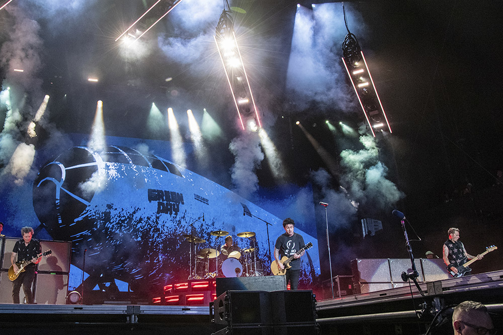 From left, Jason White, Billie Joe Armstrong, Tré Cool, and Mike Dirnt of Green Day perform on at the Lollapalooza Music Festival on July 31, 2022, at Grant Park in Chicago. (AP/Invision/Amy Harris)