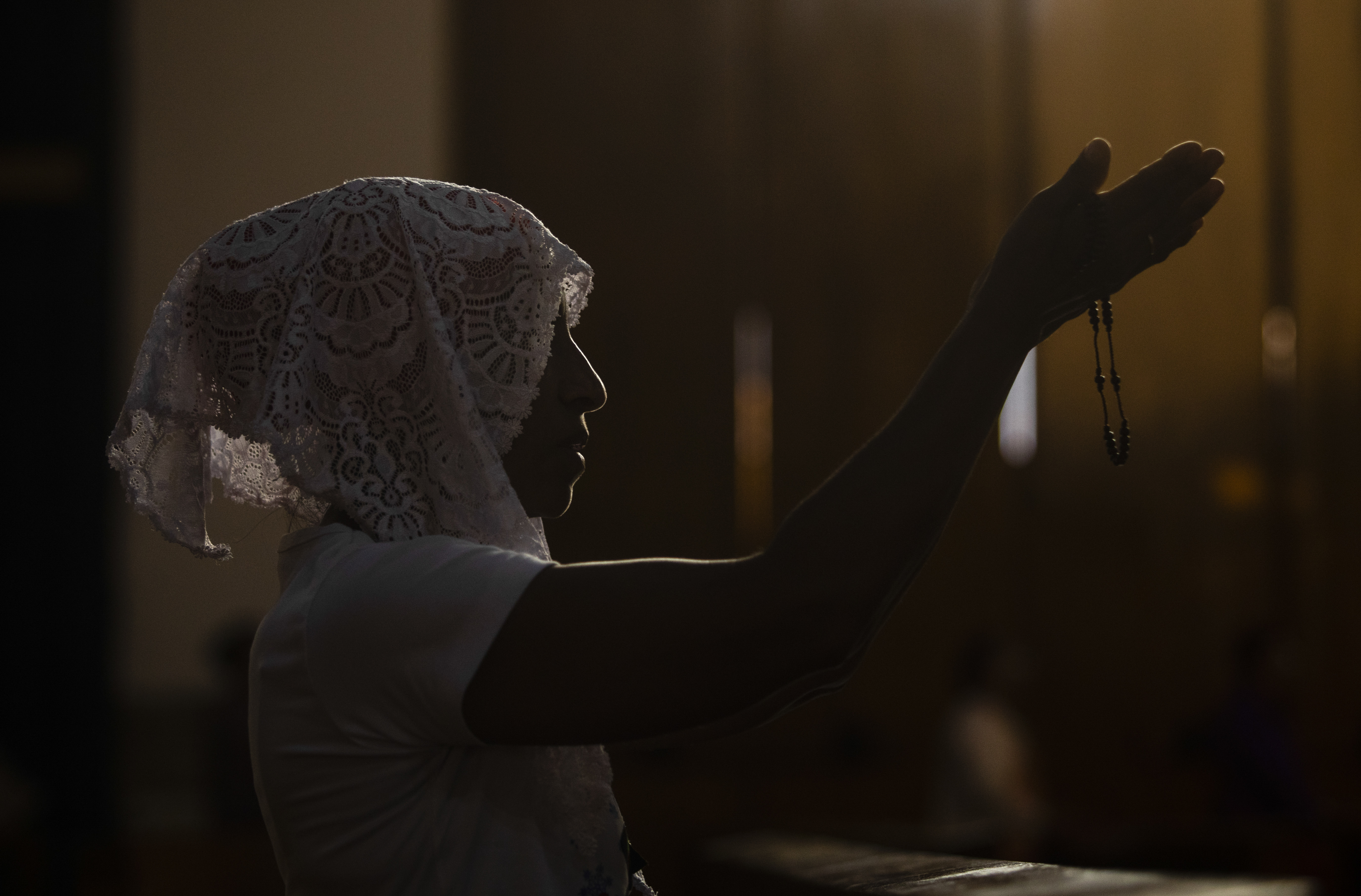 During Lent, a woman prays during the Stations of the Cross at the Metropolitan Cathedral of Managua, Nicaragua, March 17, 2023. Amid tensions between the Vatican and Daniel Ortega's government, Catholics held the devotional in the gardens of the cathedral due to the police prohibition on celebrating religious festivities in the streets. (AP/Inti Ocon)