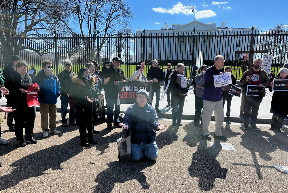 Christian activists demonstrate for a cease-fire in the Israel-Hamas war after an Ash Wednesday Mass near the White House in Washington, Feb. 14, 2024. (RNS/Aleja Hertzler-McCain)