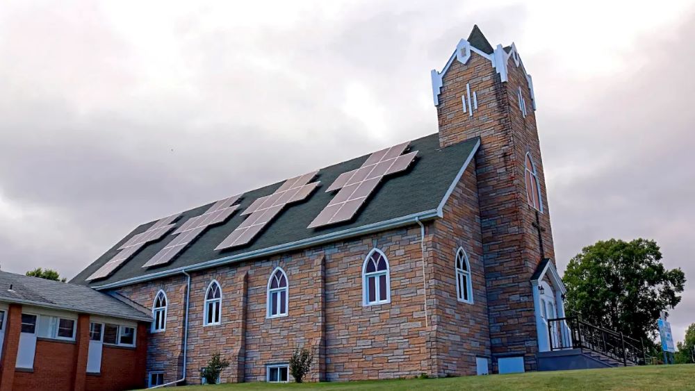 a church with solar panels on the roof. Education Images / Universal Images Group / Getty Images