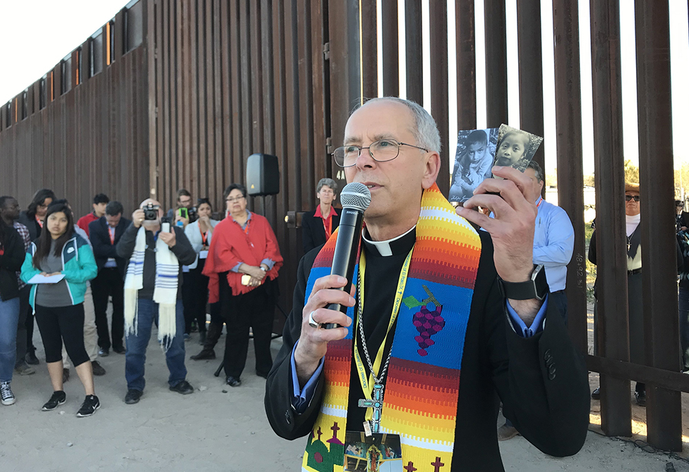 ishop Mark Seitz of El Paso, Texas, is seen Feb. 26, 2019, at the U.S.-Mexico border wall. Seitz spoke of a "broader, brutal, historical project in Texas to criminalize and police people who migrate" during a lecture March 18 at Fairfield University. (OSV News/David Agren)