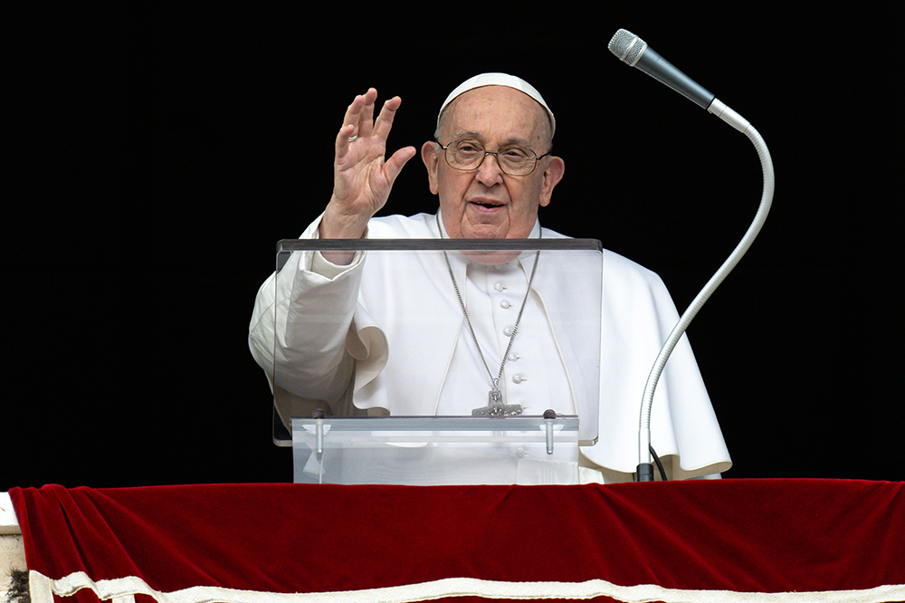 Pope Francis greets visitors gathered in St. Peter’s Square for the recitation of the Angelus at the Vatican March 3, 2024. (CNS/Vatican Media)