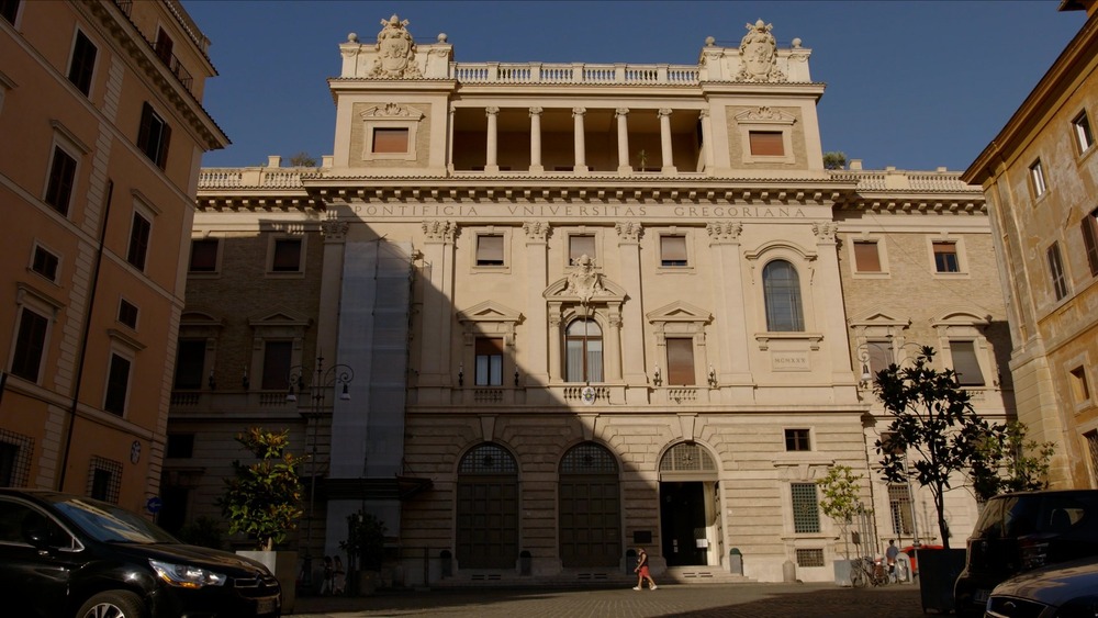 Imposing stone facade half in shadow