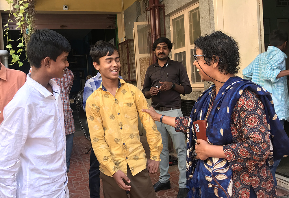 Gleaners of the Church member Silvy Lawrence Pazherickal (right) interacts with her children at BOSCO Yuvakendra, in Bengaluru, southern India. (Thomas Scaria)