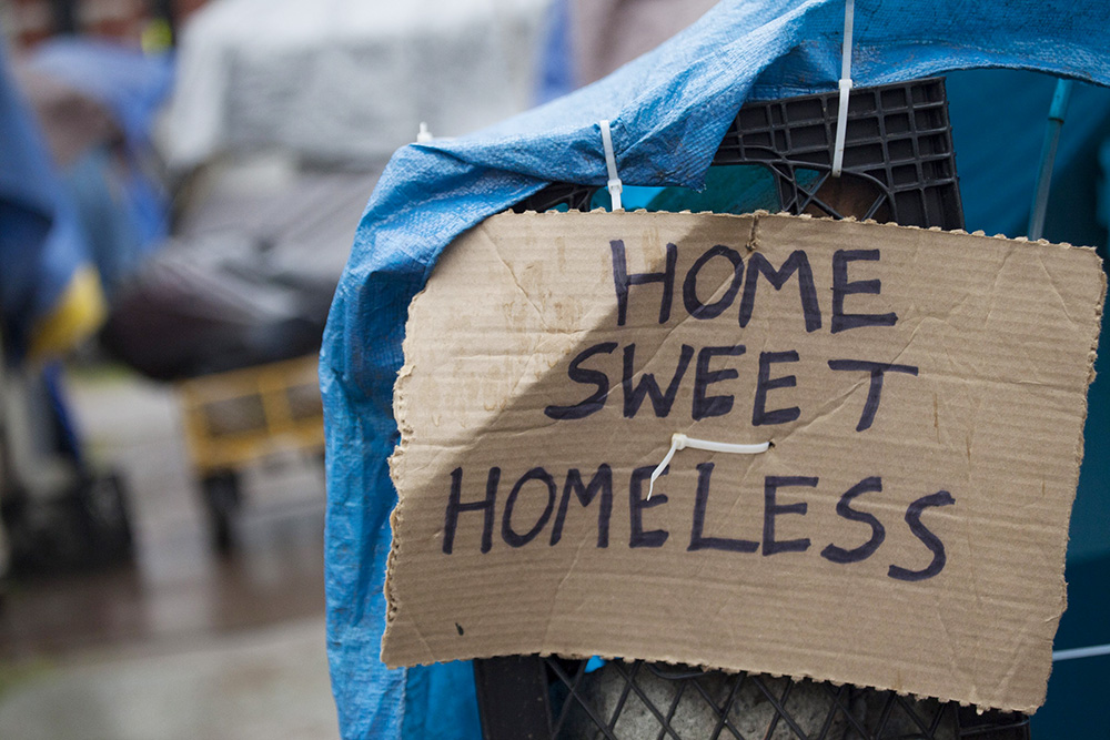 A sign is pictured in a file photo at a homeless encampment in Seattle. (OSV News/Reuters/David Ryder)