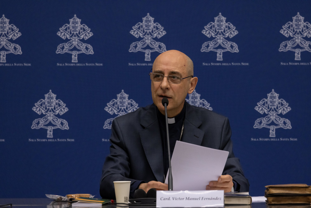 Cardinal Víctor Manuel Fernández, prefect of the Dicastery for the Doctrine of the Faith, speaks at a news conference to present the dicastery's declaration, "Dignitas Infinita" ("Infinite Dignity") on human dignity at the Vatican press office April 8, 2024. (CNS photo/Pablo Esparza)